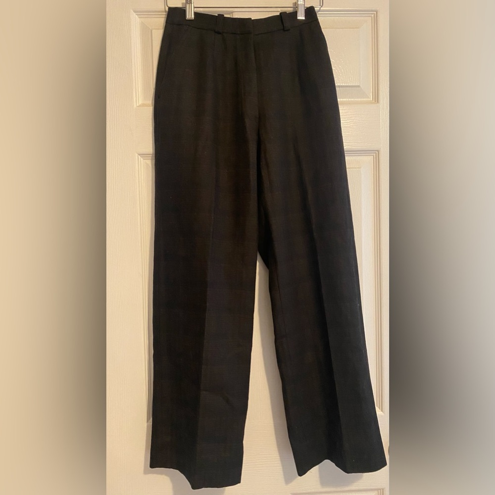 Black and brown checkered trousers.